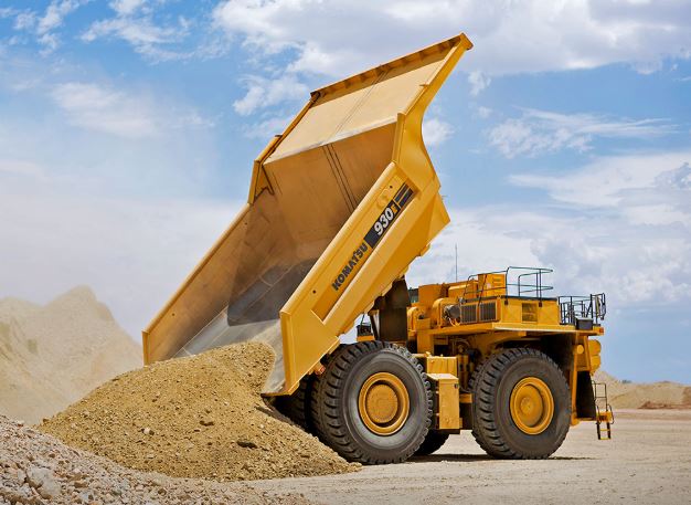 New Komatsu Dump Truck dumping dirt
